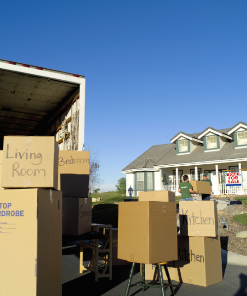 A moving truck with boxes in the back of it