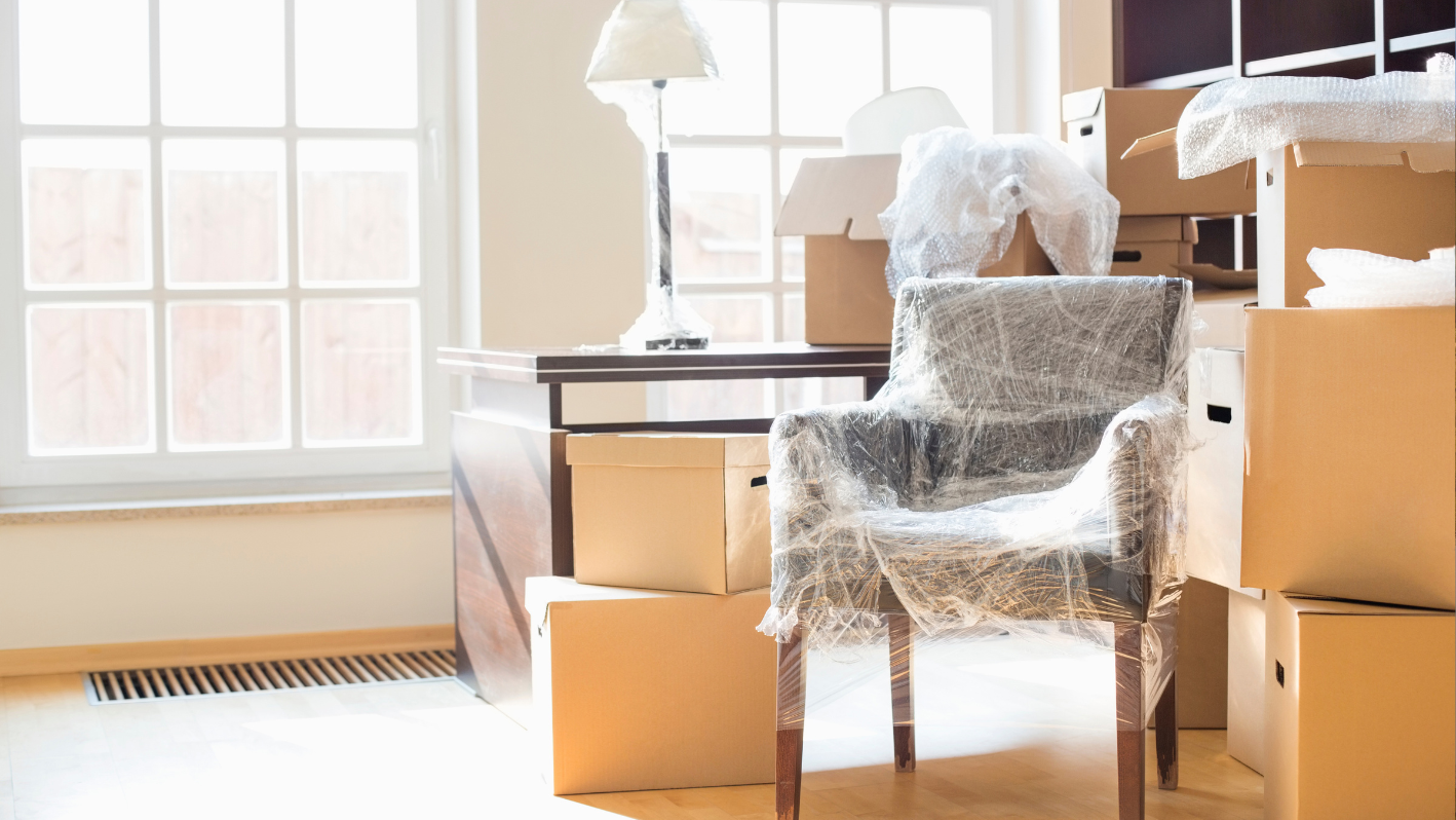 A chair sitting on top of a pile of boxes